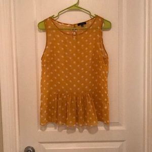 Adorable yellow polka dot top. Size M